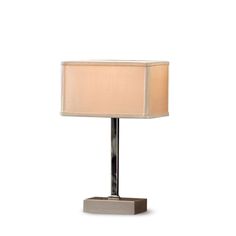 a table lamp with a beige shade on it's base and a white background