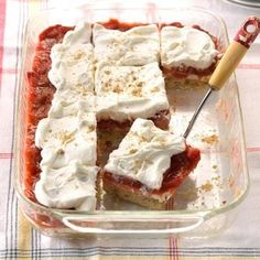 a dessert dish with strawberries and whipped cream