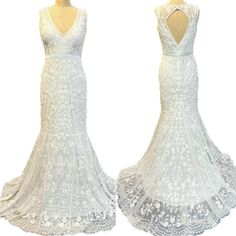 two white dresses on mannequins with lace