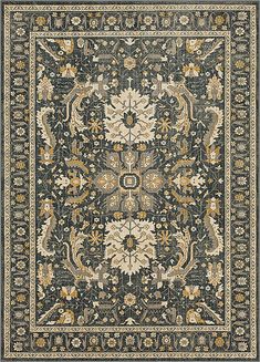 a rug with an ornate design on the center and sides in blue, yellow and beige colors