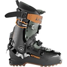 the atomic ski boot is shown in black and grey with an orange accent on the sole