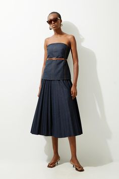 Feel Elevated In Our Midi Dress, With A Universally Flattering Silhouette, A Long Skirt That Creates Flowing Movement, And Pleated Detailing. The Denim Fabric Creates A More Relaxed Style, So Style This Dress With Sandals, Loafers, Or Heels For A Look That Goes Seamlessly From Day To Night. Tailored Denim Bandeau Pleated Full Skirted Midaxi Dress High Quality Denim Fabric Flattering Fit And Flare Silhouette Bandeau Neckline Belted Waistline Textured, Pleated Skirt Drop Waist Bodice Midi Length R Hen Do Outfits, Bride Jumpsuit, Petite Wedding Guest Dresses, Plus Size Workwear, Eid Outfits, Tall Dresses, Outfits Petite, Full Skirt Dress, Midaxi Dress