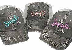 "Your choose of ONE of these Hats. The Single One, The Crazy One, The Sarcastic One embroidered on a trucker style hat.  You can pick which hat(adjective) you would like on your hat.  These are Perfect for Best Friends, Girls Night Out, Brides Maids, or just for you! Design embroidered as shown.  You can pick the color of hat and in the personalization section you can pick the tread colors. Personalization Section: 1.  Pick the Word/Adjective you want. 2. Thread color for THE and ONE 3. Thread c Which Hat, Favorite Sweater, The Crazy, 3 In One, Snap Backs, Pink Sweatshirt, Girls Night Out, Trucker Cap, Girls Night