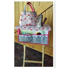 a purse sitting on top of a wooden stool