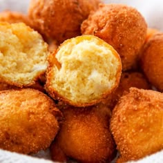 some fried food is in a white bowl