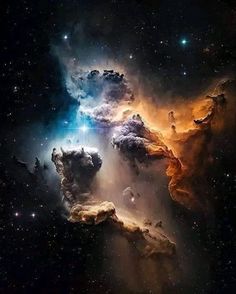 an image of some kind of cloud in the sky with stars and clouds around it