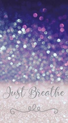 the words just breathe in front of glitter