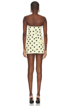 Find AREA Polka Dot Strapless Mini Dress In Yellow on Editorialist. AREA Polka Dot Strapless Mini Dress in Yellow Self: 100% cotton Lining: 100% viscose. Made in China. Dry clean only. Unlined. Front zipper closure. 4-pocket styling. Rigid denim fabric with glossy polka dots. ARFE-WD138. 2401D16332. About the designer: AREA is a fashion and accessories label specializing in quality craftsmanship, textile development, and innovative embellishment. Founded by designers Beckett Fogg and Piotrek Pansczczyk in downtown NYC, AREA’s signature style is multi-faceted: witty, inherently glam, playfully decadent, and injected with a pop energy. The brand shares its name and spirit with the iconic 80s Manhattan nightclub, known for its fusion of art and performance in conceptually-themed events. Since Mod Mini Dress, Cream Yellow, Yellow Cream, Strapless Mini Dress, Cream Dress, Polka Dot Dress, Denim Fabric, Signature Style, Front Zipper