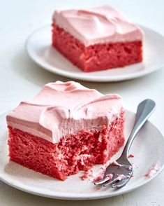 two slices of red velvet cake on white plates