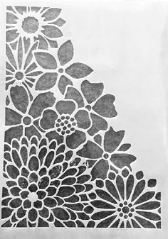 a black and white photo of flowers on a piece of paper