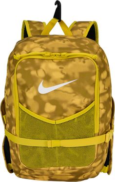 a yellow and black backpack with a white nike logo on the front, it's attached