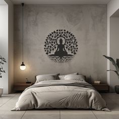 a bedroom with a bed, plant and buddha wall decal