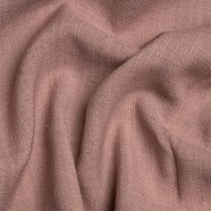 a close up view of a pink fabric