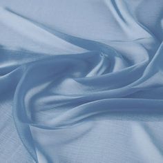 This lightweight and flowing fabric is made from a luxurious chiffon. It's wrinkle-resistant and offers impeccable drapes. With a matte-like finish and soft-touch feel, cationic chiffon provides outstanding comfort and a timeless look. WOVEN Contents: 100% POLYESTER Weight-Gr/Sqm: 53.5711 Width: 58/60" Country of origin: KOREA Size: 1 YARD.  Color: Blue. Easter Backdrops, Draping Fabric, Festival Skirts, Mint And Navy, Blue Orchids, Green Baby, Coral Blue, Creative Hobbies, Aqua Green