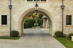 an archway leading into a stone building