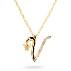 The “Letter V” pendant necklace features a delicate butterfly and lab-grown diamonds set in white or yellow gold. Available in 10K or 14K white or yellow gold pendants feature a 10K rose gold butterfly Available chain lengths: 16 and 18 inches Set with round lab-grown diamonds, .055 ctw Attention to quality and detail is paramount to Ivy Jewelry Made in New York City Inspiration Timeless. Sentimental. Elegant. The designer added a delicate butterfly to each letter in the series to symbolize a “b V Letter Gold Pendant, V Locket Letter Gold, V Initial Necklace, Loket Sets Gold Design, Letter V Necklace, Letter Pendent, Ivy Jewelry, V Pendant, Gold Letter Pendants