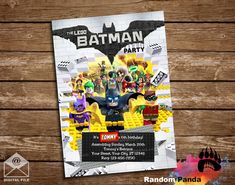 the lego batman party poster is displayed on a wooden table