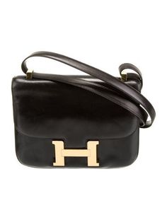 Hermès Shoulder BagVintageNoir Box LeatherGold-Plated HardwareFlat HandlesSingle Exterior PocketLeather Lining & Dual Interior PocketsSnap Closure at FrontIncludes Dust BagUnfortunately, due to restrictions, this item may not be eligible for shipping in all areas. Hermes Box, Women Handbags, Plating, Exterior, Shoulder Bag, Handbags, Black