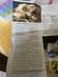 some food is sitting on top of a table with papers and other items around it