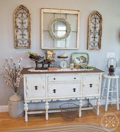 (paid link) If you are a child of the 90s, the idea of mirrored coffee tables would most likely feel both odd and garish. In an era where beige was the color of. Buffet Table Ideas Decor Farmhouse, Farmhouse Sideboard Decor, Wall Vignettes, Farmhouse Easter Decor Ideas, Buffet Decorating Ideas, Buffet Decor Ideas, Oster Dekor, Easter Decor Ideas, Farmhouse Buffet