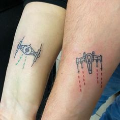 two people with matching tattoos on their arms, one has an eye and the other has a plane