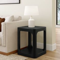 Elevate your living space with the Plank+Beam Forma Square Side Table, a harmonious blend of durability, style, and functionality. Crafted with precision, this table features a solid pine wood tabletop, legs, and a convenient bottom shelf, providing a modern aesthetic and sturdy construction. Our commitment to safety is evident in the non-toxic finishes applied to every inch of this end table. Enjoy peace of mind knowing that every detail is designed with your well-being in mind, making it a per Side Table With Shelf, Side Table Living Room, Cube Side Table, Black End Tables, Living Room Essentials, Table For Small Space, Square Side Table, Black Side Table, Corner Table