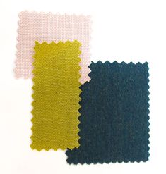 three different colors of fabric on top of each other