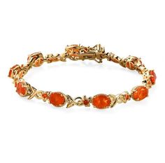 Like the fierce flames of fire, this gold premium Mexican fire opal link bracelet sparks the joy Waring bold designs. Fierce flames of fire symbolize passion and divinity. Premium Mexican fire opals are embellished in a symmetrical row with a secure setting. When exposed to light, this gemstone ignites a cherry red spectrum with a pinch of orangutan hues. This fancy bracelet is crafted in 14K yellow gold to compliment the fierce hues of fire. The metal frame is tarnish-resistant and heightens th Fire Fairy, Fancy Bracelet, Fire Opals, Fancy Boxes, Bracelet Tennis, Mexican Fire Opal, Wedding Jewelry Bracelets, Opal Bracelet, Bracelet Gemstone