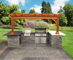 an outdoor bbq with grill and seating area