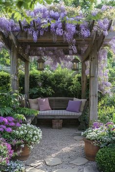 a bench sitting in the middle of a garden with purple flowers growing all over it