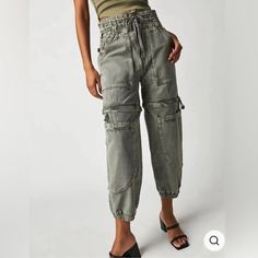 Nwt Free People Wind Drift Convertible Pants Utility Shorts Zipper In Ivy League- Sold Out Online! Free People Wind Drift Convertible Pants Utility Shorts Zipper Knees New With Tags Retail Price- $198 Material 81% Cotton * 19% Linen Elastic Waist Elastic Hem Measurements: Size M Waist: 14.5" Hips: 24.5" Rise: 12.5" Thigh: 13" Inseam: 26" Waist Down Length- 38" Leg Opening: 8" Wide Cropped Pants, Convertible Pants, Free People Romper, Utility Shorts, Drop Crotch Pants, Relax Pants, Tie Dye Leggings, Sweater Jumpsuit, Flowy Pants