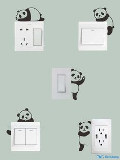 some pandas are on the wall and one is plugged into an electrical outlet