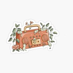 an orange radio sticker with flowers and leaves around it on a white background,