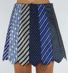 there is a woman wearing a skirt made out of different ties on her butts