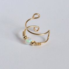 Dainty Adjustable Ear Cuff For Pierced Ears, Adjustable Brass Single Ear Cuff, Adjustable Brass Cartilage Earrings For Gifts, Adjustable White Ear Cuff Single Earring, Adjustable White Ear Cuff, Adjustable White Single Ear Cuff, Adjustable Brass Pierced Ear Cuff, Dainty Adjustable Ear Cuff For Gift, Adjustable Nickel-free Cartilage Earrings For Wedding