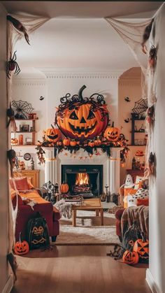 a living room decorated for halloween with pumpkins