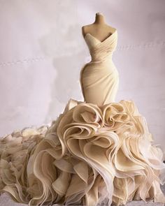 a dress made out of ruffled fabric