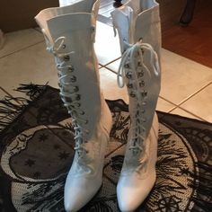 Brand New White “Good Witch” Or Bride Dressy Boot, Gothic, Victorian Lace-Up Boot. It Measures 15 Inches From The Bottom Of The Heel To The Boot Top. The Heel Height Measured Near The Arch Is 2 Inches. The Heel Measured In The Back Of The Boot Is Almost 3 Inches. Please Note In The Last Two Photos, There Is A Slight Discoloration In The Lace And A Tiny Black Mark, Neither Of Which Is Noticeable Since It’s On The Inner Side Of The Boot. (2242) Dressy Boots, White Goth, Goth Boots, Good Witch, Gothic Victorian, Victorian Lace, The Arch, Lace Up Boots, Shoe Laces