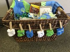 a wicker basket filled with baby items