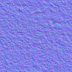 a blue and purple wall with small dots on it's surface, as well as the