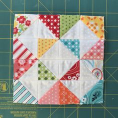 an image of a patchwork quilt on a cutting board with the instructions to make it