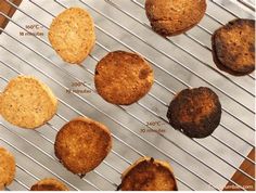 several different types of cookies cooling on a wire rack, with instructions to make them