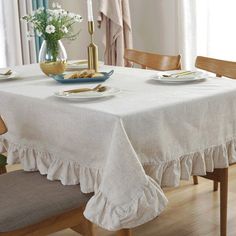 a white table cloth with ruffled edges