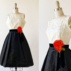 1950s Large Floral Silk Jacquard Party Dress. Ivory Bodice With A Round Neckline, Deep Scoop Back And Sleeveless. Attached Large Coral Orange Flower And Vine On The Waist Along With A Black Velvet Sash That Closes With A Hook And Eye. Full Skirt With Wide Pleating. Back Painted Metal Zipper And Hook And Eye Closure. Dress Is In Excellent Vintage Condition. Shown With A Petticoat That Is Not Included. Original Tag Attached: Union Label Material: Silk Jacquard, Velvet And An Acetate Flower. Holes: No Stains: No Snags Or Runs In Fabric: No Color Fading: No Odor: No Attached Buttons: N/A Working Zipper: Yes Back Metal Zipper And Hooks And Eyes For Closure. Pockets: No Measurements: Size: Smal 1950s Party Dresses, 1950s Party, Dresses 1950s, Jacquard Dress, 50s Dresses, Orange Flower, Painted Metal, 1950s Dress, Coral Orange