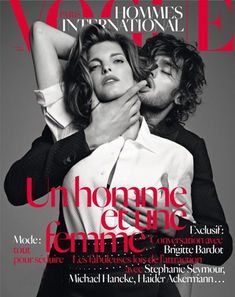 a man kissing a woman on the cover of a magazine