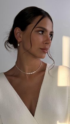 Elevate your bridal look with this wedding pearl necklace and classic pearl earrings set, designed to add a touch of timeless elegance. The dainty choker features delicate pearls and crystals, creating a minimalist and sophisticated aesthetic perfect for any bride. The matching pearl drop earrings complement the necklace, offering a flawless finish to your wedding ensemble. This bridal jewelry set is a perfect gift for the bride, enhancing her special day with its elegant simplicity. It's also a Bridal Necklace Simple, Wedding Jewelry For Lace Dress, Bride Pearl Jewelry, Feminine Silver Pearl Necklace For Wedding, Delicate Pearl Necklace For Wedding, Pearl White Dainty Necklace For Wedding, Delicate Pearl White Necklace For Wedding, Delicate Single Strand Bridal Necklace For Wedding, Delicate Pearl White Bridal Necklace