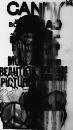 black and white photograph of graffiti on a wall with words that read can't be more beautiful than pictures