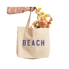 Our stylish Beach Canvas Tote is the perfect bag to pack for a seaside escape. It's a fashionable way to carry your essentials while keeping it breezy and beachy - no matter where you go! Sand-colored Travel Bags For Beach Season, Sand-colored Shoulder Bag For Summer Travel, Chic Canvas Beach Bag For Travel, Trendy Canvas Beach Shoulder Bag, Trendy Canvas Bag For Beach Season, Summer Canvas Shoulder Bag For Daily Use, Trendy Canvas Vacation Bag, Trendy Summer Canvas Bag For Daily Use, Trendy Canvas Shoulder Bag For Beach Season