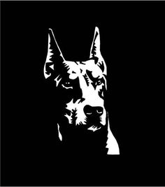 a black and white photo of a dog's head on a black background,