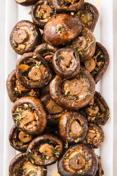 mushrooms are piled on top of each other and ready to be cooked in the oven